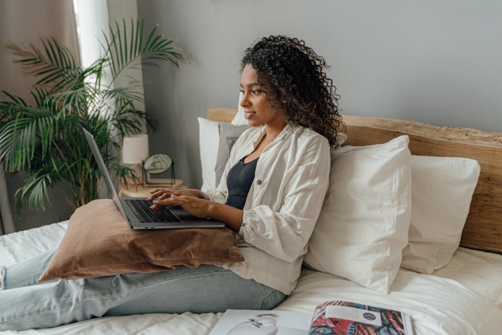 Woman working on side hustle for part-time income at home